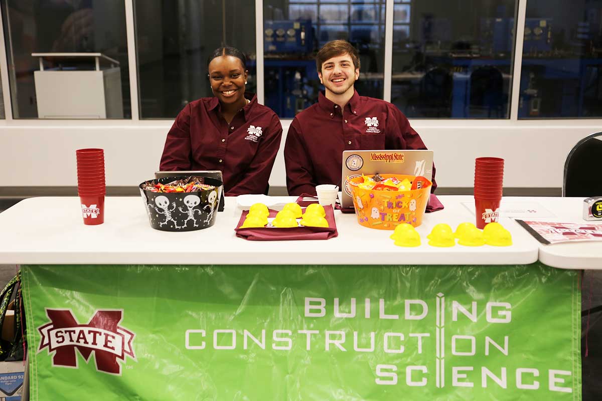 BCS student Jazmine Melton, left, and fellow male BCS student sit at their table