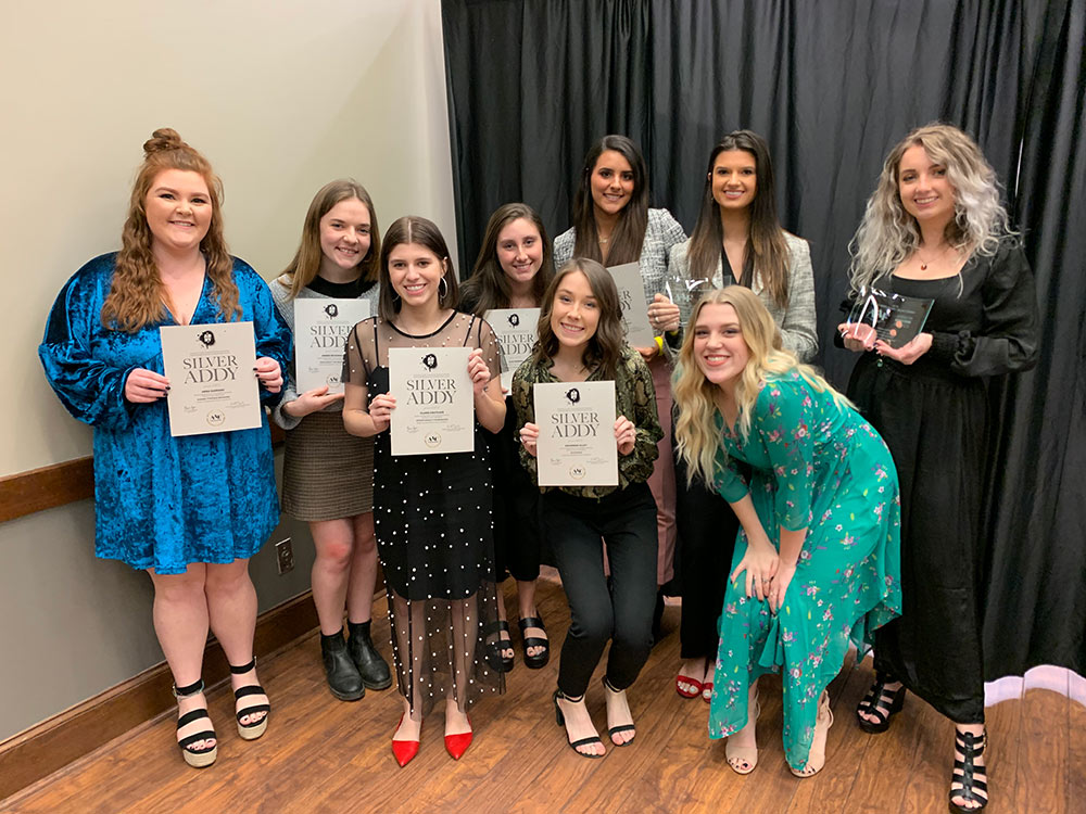 students posing with certificates: Left to right: Anna Claire Garrard, Amber McDonald, Claire Crutcher, Alex Herring, Savannah Alley, Morgan Pearce, Maddie Rosenbaum, Meghan Norman, Hannah Chapman