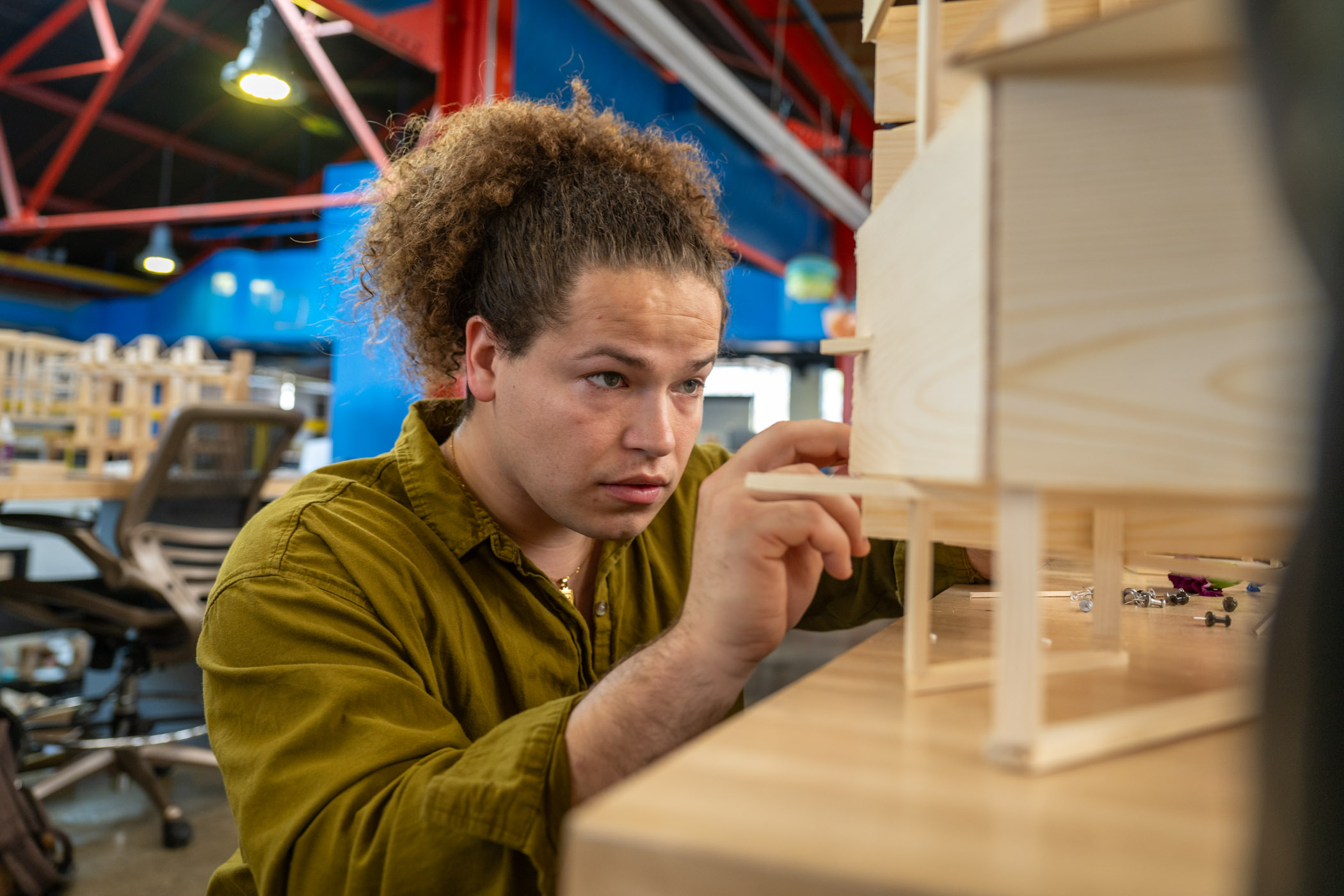 man building a model