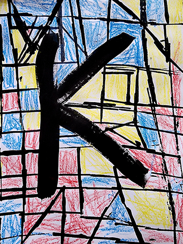 Drawing of the letter K over blocks of colors.