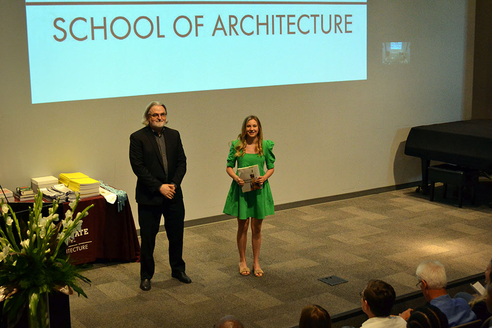 Professor Jassen Callender, left, stands with Audrey Eisner