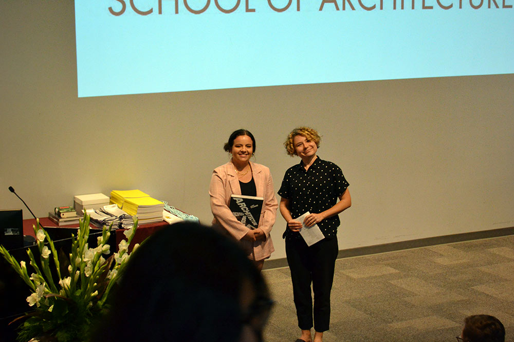 Caeli Finch, left, stands with Professor Kate Malia