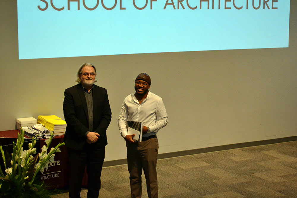 Professor Jassen Callender, left, stands with Chester Mitchell