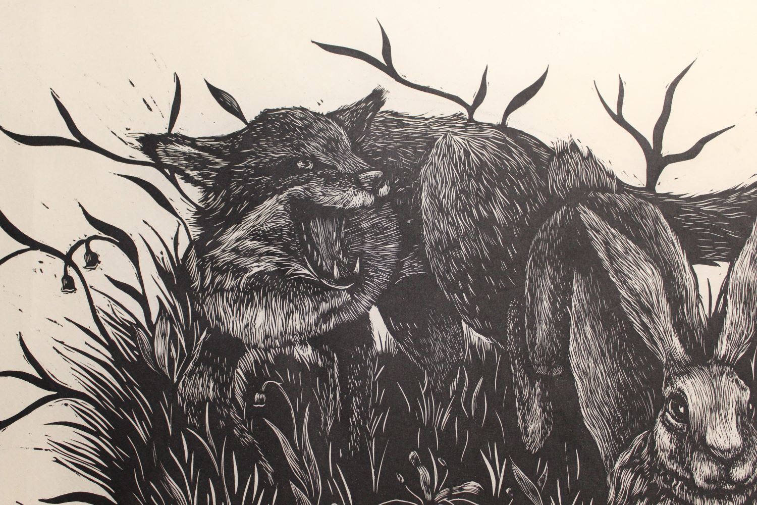 wood cut print of a fox and rabbit in grass