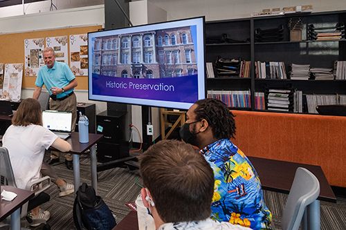 historic preservation students sit, listen to Professor Jeff Fulton