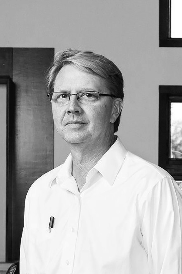 black and white headshot of John Anderson