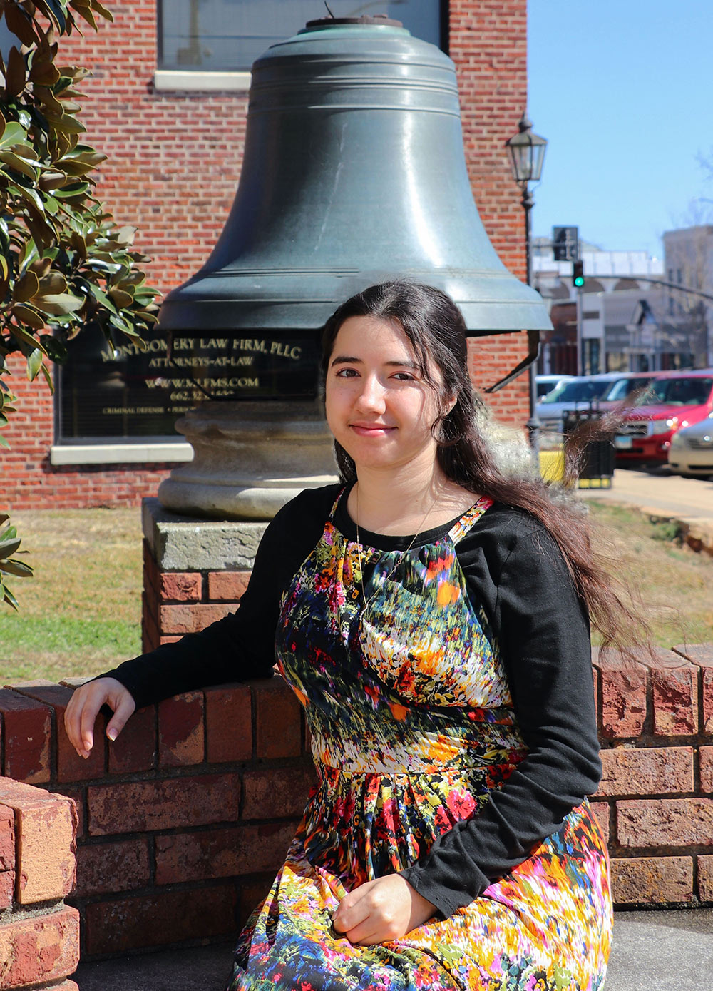 Sarah Richardson sits in front of Liberty Bell