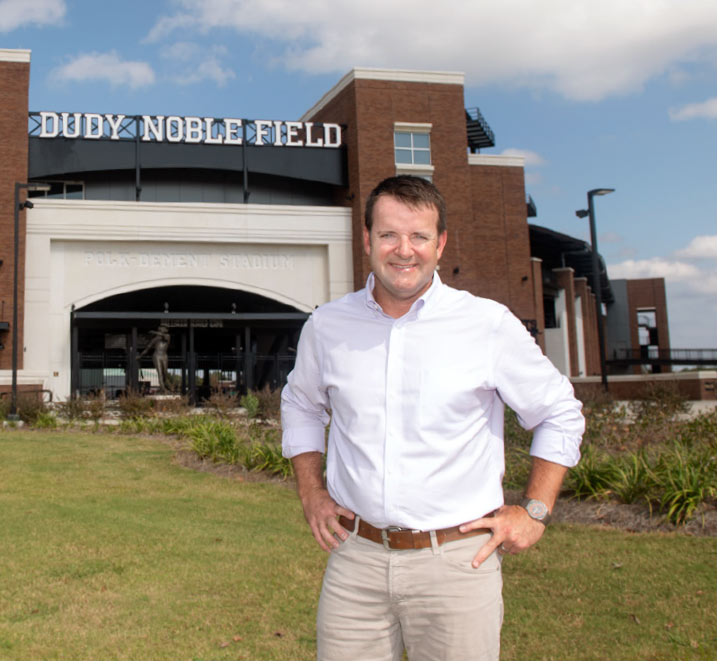 Michael Boerner poses in front of the Dudy Noble field entrance