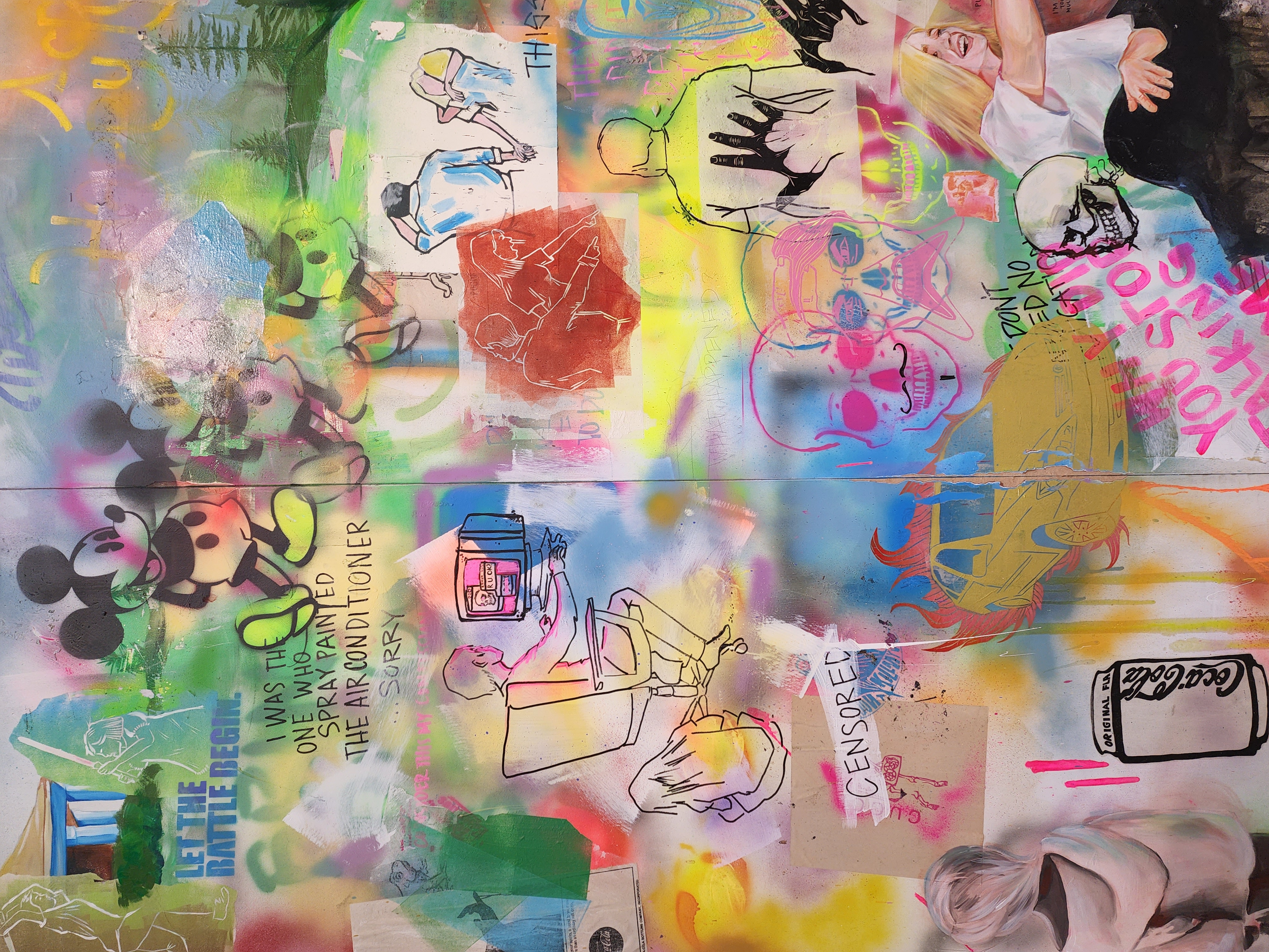 Close up of a collage of florescent spray paint, prints, hand painted images, and mixed media telling a story of a brother and sister from childhood to adulthood.